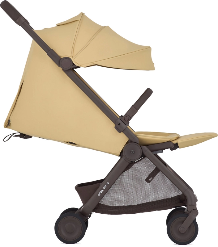 Anex Air-Q żółty wózek dziecięcy z pozycją leżącą.