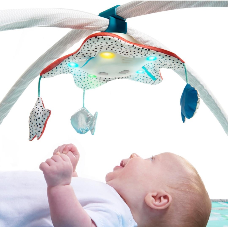 Tiny Love - mata edukacyjna z pałąkami i karuzelką | Skarby Oceanu